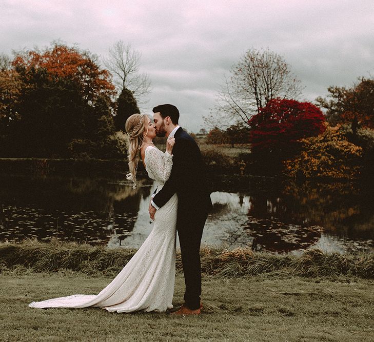 Elegant White Wedding In Somerset With Bride In Lace Long Sleeved Gown With Open Back And Loose Braid With Hair Vine Images From Carla Blain Photography