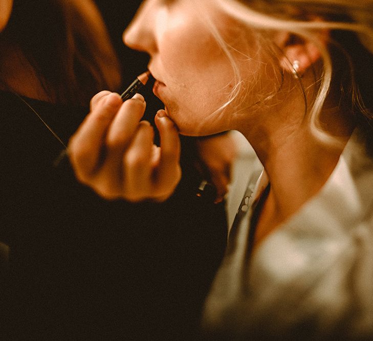 Bride Getting Ready // Elegant White Wedding In Somerset With Bride In Lace Long Sleeved Gown With Open Back And Loose Braid With Hair Vine Images From Carla Blain Photography