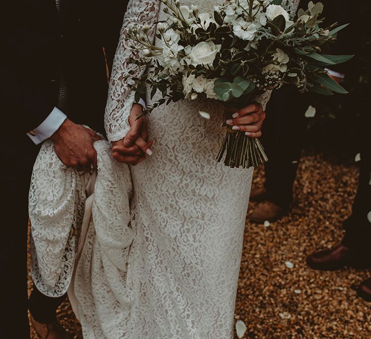 Elegant White Wedding In Somerset With Bride In Lace Long Sleeved Gown With Open Back And Loose Braid With Hair Vine Images From Carla Blain Photography