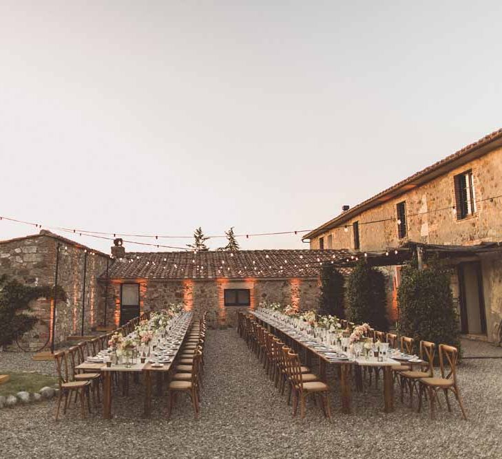 Outdoor Dining At Italian Wedding // Bridesmaids In Grey Dresses By Jenny Yoo // Rustic Luxe Wedding In Tuscany Styled By The Wedding Of My Dreams With Flowers By Passion For Flowers Anna Campbell Bride Images & Film From WE ARE // THE CLARKES