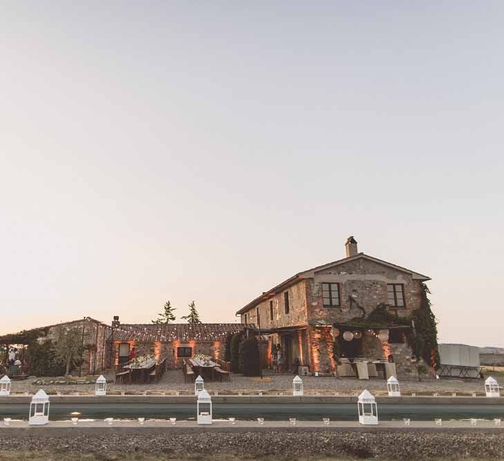 Outdoor Dining At Italian Wedding // Bridesmaids In Grey Dresses By Jenny Yoo // Rustic Luxe Wedding In Tuscany Styled By The Wedding Of My Dreams With Flowers By Passion For Flowers Anna Campbell Bride Images & Film From WE ARE // THE CLARKES