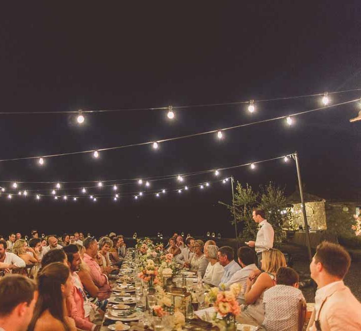 Outdoor Dining At Italian Wedding // Bridesmaids In Grey Dresses By Jenny Yoo // Rustic Luxe Wedding In Tuscany Styled By The Wedding Of My Dreams With Flowers By Passion For Flowers Anna Campbell Bride Images & Film From WE ARE // THE CLARKES