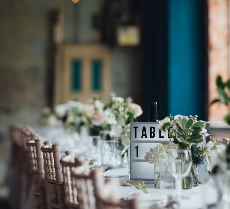 Relaxed Wedding Reception With Wooden Trestle Tables