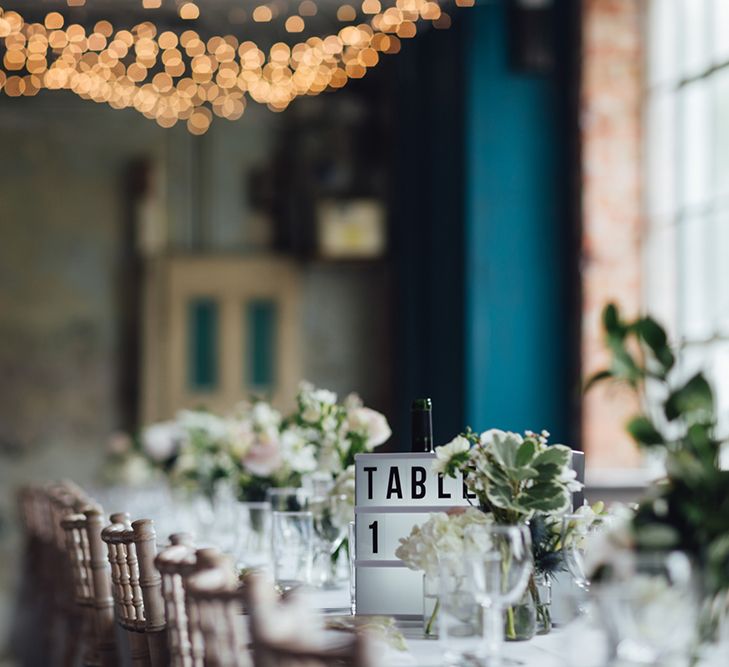 Relaxed Wedding Reception With Wooden Trestle Tables