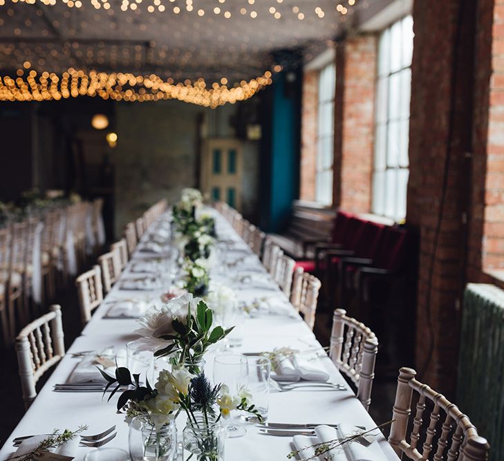 Relaxed Wedding Reception With Wooden Trestle Tables