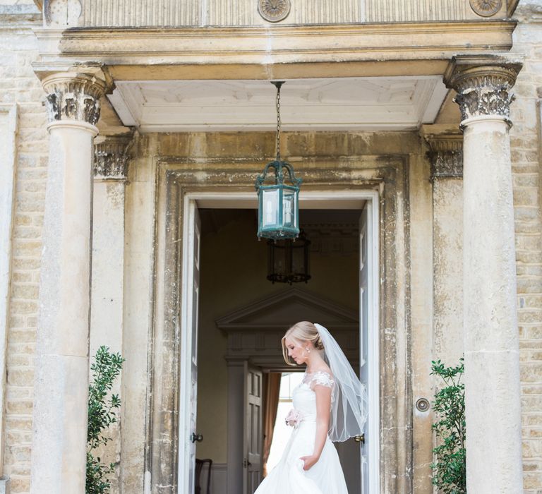 Bride in Naomi Neoh Wedding Dress