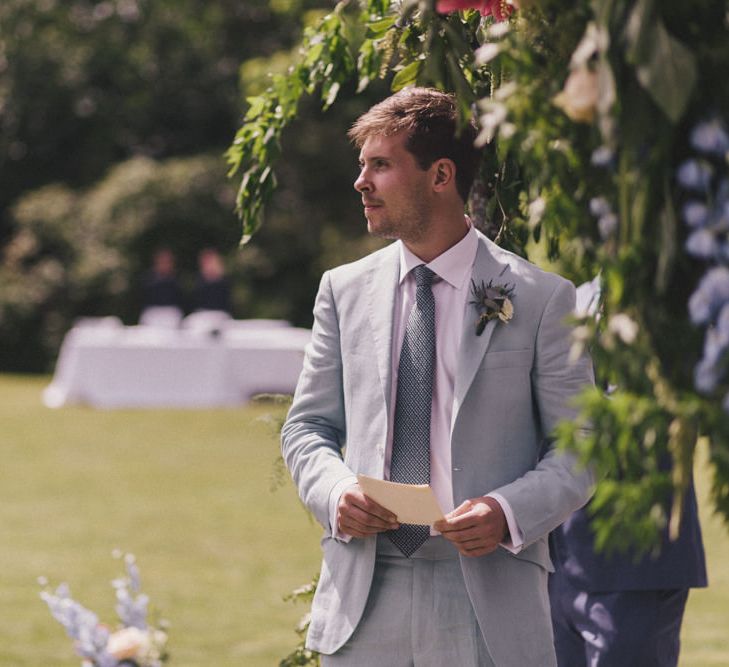 Groom In Linen Suit