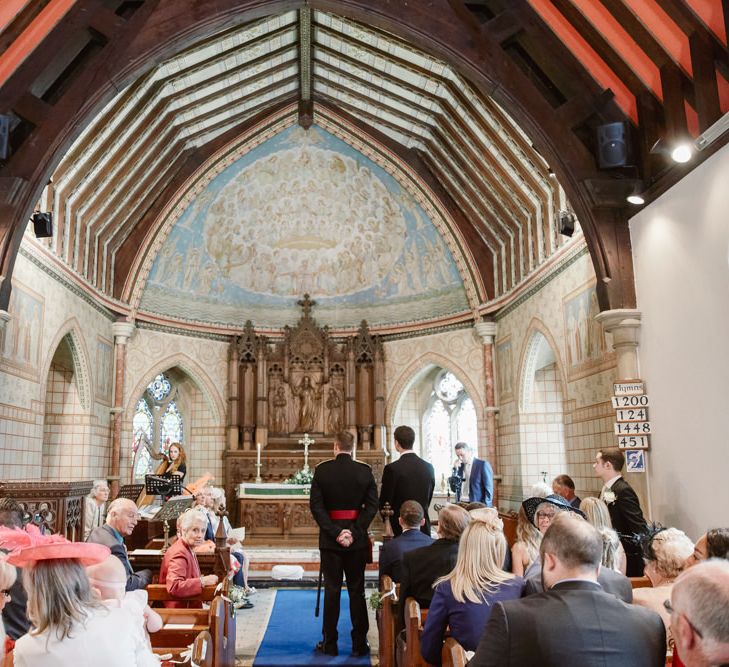 Groom in Military Uniform at the Church Altar Bride Getting Ready in Naam Anat Bridal Gown | Natalie J Weddings Photography