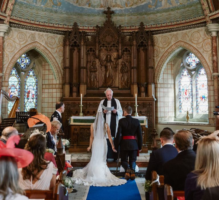 Church Wedding Ceremony | Bride in Naam Anat Bridal Gown | Groom in Military Uniform | Natalie J Weddings Photography