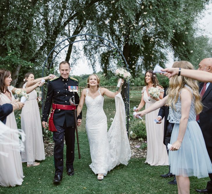 Confetti Moment | Bride in Naam Anat Bridal Gown | Groom in Military Uniform | Natalie J Weddings Photography