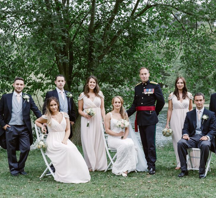 Bridal Party | Bride in Lace Naam Anat Bridal Gown | Bridesmaids Blush Pink ASOS Dresses | Groom in Military Uniform | Groomsmen in Morning Suits | Natalie J Weddings Photography