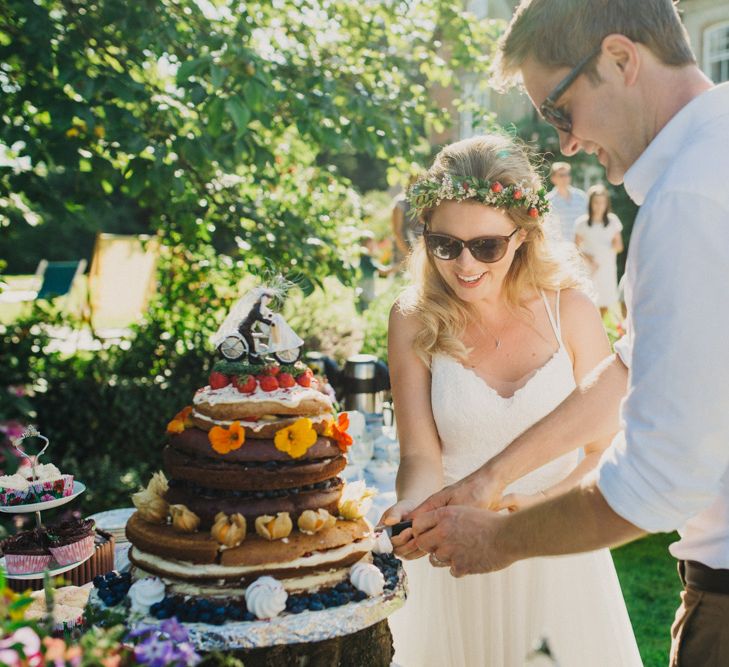 Bride & Groom Cutting the Cake