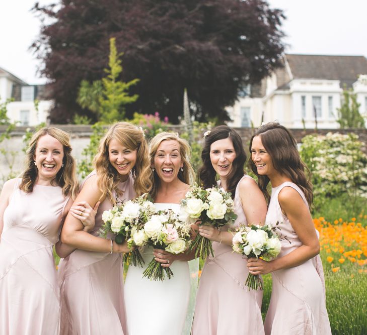 Bridesmaids In Pink Ghost Dresses