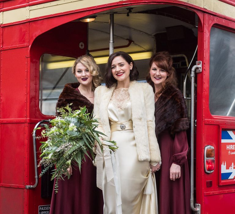 Bridesmaids in Burgundy BHLDN Dresses | Bride in Story of My Dress Bridal Gown | Greenery Bouquet | Vintage Wedding at The Asylum & Town hall Hotel London | Kevin Fern Photography