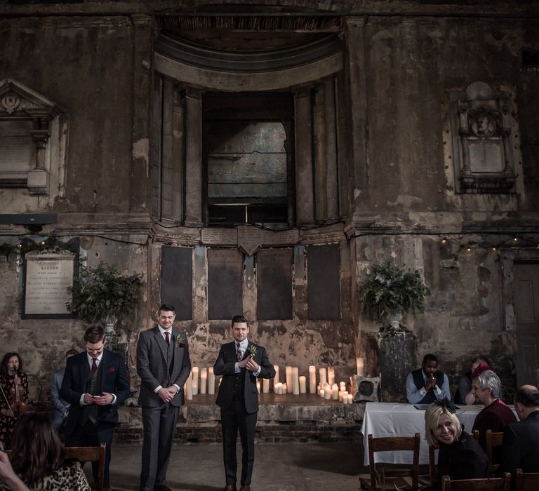 Groom in Navy Suits from Tom James Tailors | Vintage Wedding at The Asylum & Town hall Hotel London | Kevin Fern Photography