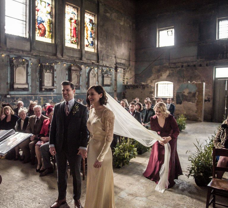 Wedding Ceremony | Bride in Story of My Dress Bridal Gown | Groom in Navy Suit from Tom James Tailors | Vintage Wedding at The Asylum & Town hall Hotel London | Kevin Fern Photography