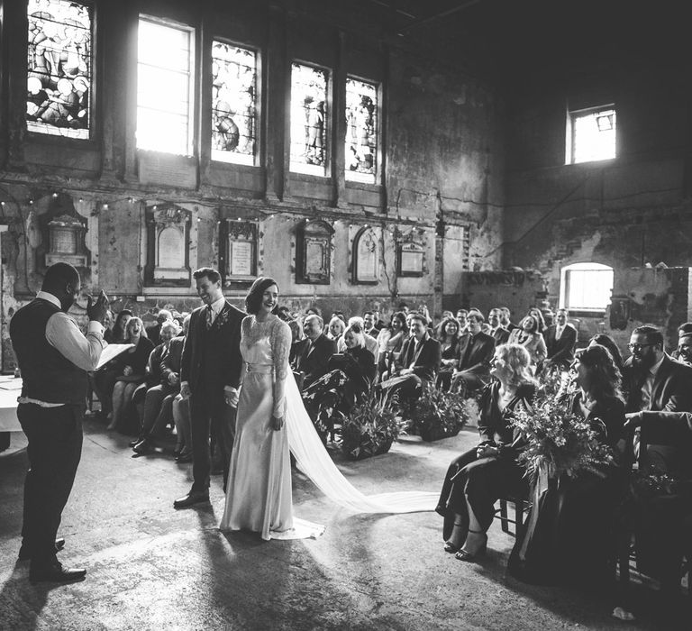 Wedding Ceremony | Bride in Story of My Dress Bridal Gown | Groom in Navy Suit from Tom James Tailors | Vintage Wedding at The Asylum & Town hall Hotel London | Kevin Fern Photography