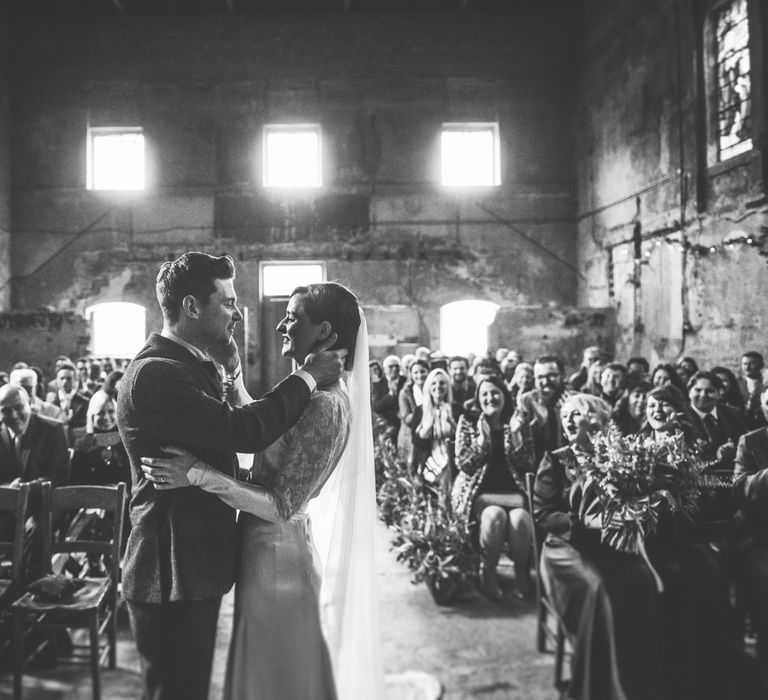 Wedding Ceremony | Bride in Story of My Dress Bridal Gown | Groom in Navy Suit from Tom James Tailors | Vintage Wedding at The Asylum & Town hall Hotel London | Kevin Fern Photography