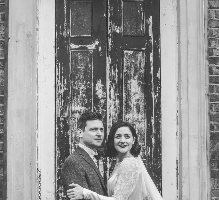 Bride in Story of My Dress Bridal Gown | Groom in Navy Suit from Tom James Tailors | Vintage Wedding at The Asylum & Town hall Hotel London | Kevin Fern Photography