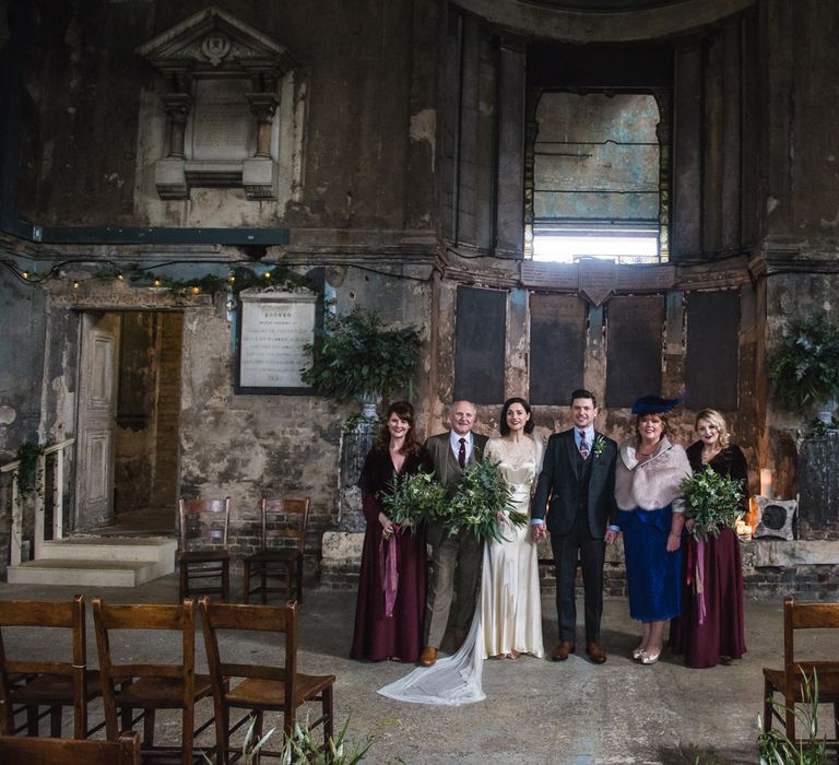 Bride in Story of My Dress Bridal Gown | Groom in Navy Suit from Tom James Tailors | Vintage Wedding at The Asylum & Town hall Hotel London | Kevin Fern Photography