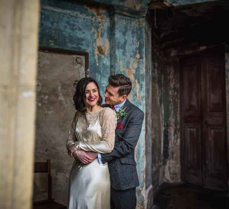 Bride in Story of My Dress Bridal Gown | Groom in Navy Suit from Tom James Tailors | Vintage Wedding at The Asylum & Town hall Hotel London | Kevin Fern Photography