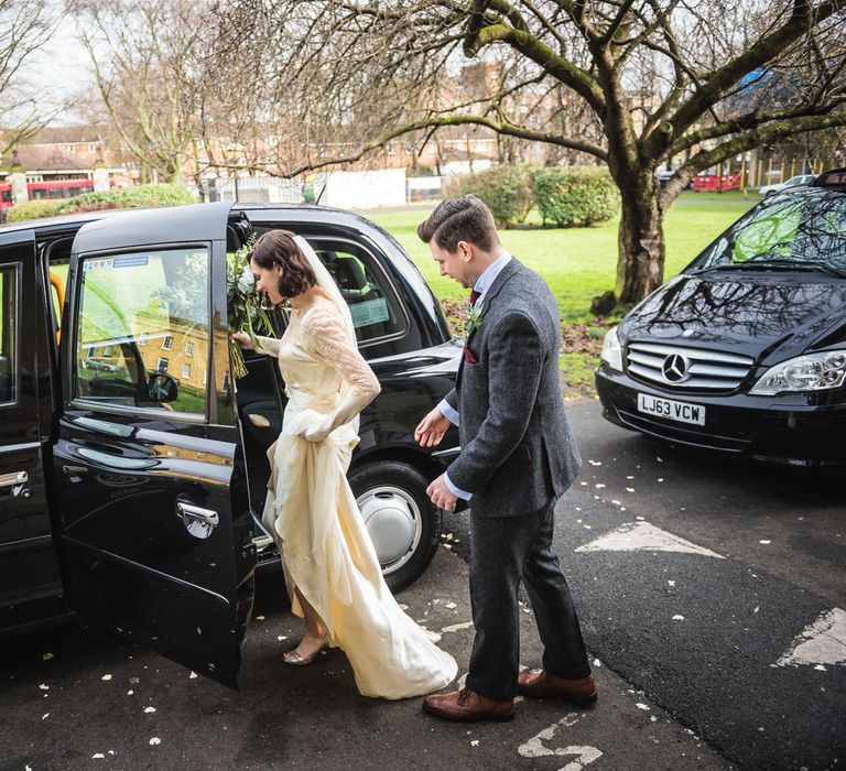 Bride in Story of My Dress Bridal Gown | Groom in Navy Suit from Tom James Tailors | Vintage Wedding at The Asylum & Town hall Hotel London | Kevin Fern Photography