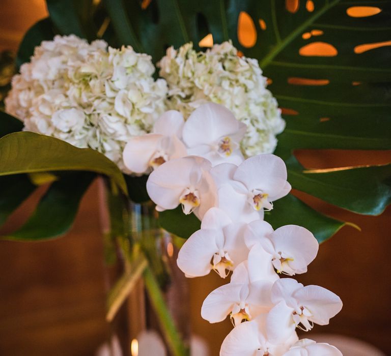 Fern Leaves, White Hydrangeas & Orchids Floral Centrepieces | Vintage Wedding at The Asylum & Town hall Hotel London | Kevin Fern Photography