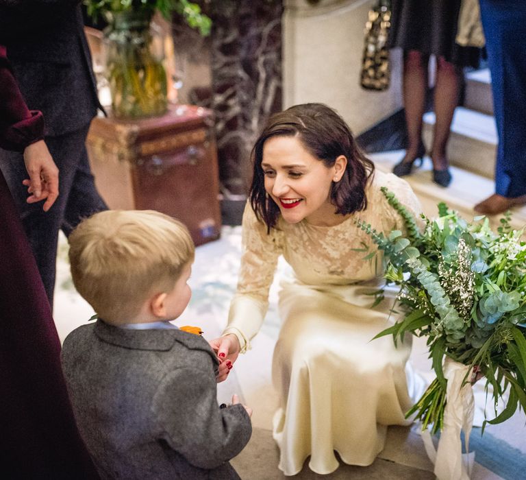 Bride in Story of My Dress Bridal Gown | Greenery Bouquet | Vintage Wedding at The Asylum & Town hall Hotel London | Kevin Fern Photography