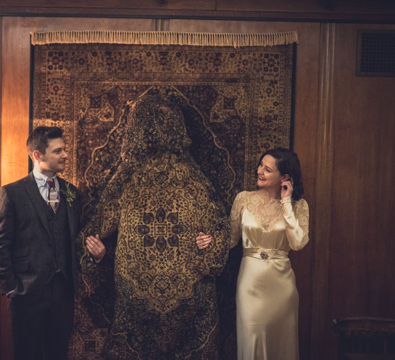 Bride in Story of My Dress Bridal Gown | Groom in Navy Suit from Tom James Tailors | Vintage Wedding at The Asylum & Town hall Hotel London | Kevin Fern Photography