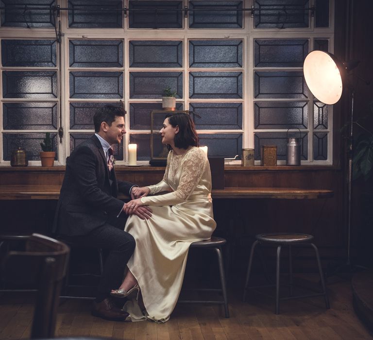 Bride in Story of My Dress Bridal Gown | Groom in Navy Suit from Tom James Tailors | Vintage Wedding at The Asylum & Town hall Hotel London | Kevin Fern Photography