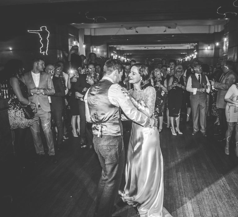 First Dance | Bride in Story of My Dress Bridal Gown | Groom in Navy Suit from Tom James Tailors | Vintage Wedding at The Asylum & Town hall Hotel London | Kevin Fern Photography