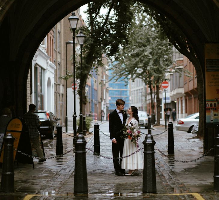 Elegant Bride in Delphine Manivet Prospere Wedding Dress & Groom in Velvet Jacket