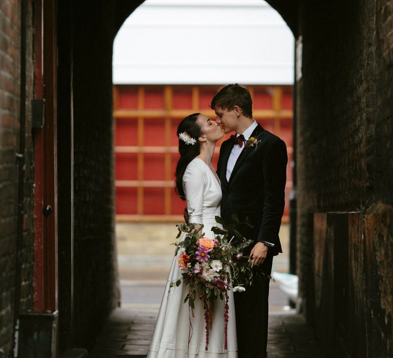 Elegant Bride in Delphine Manivet Prospere Wedding Dress & Groom in Velvet Jacket