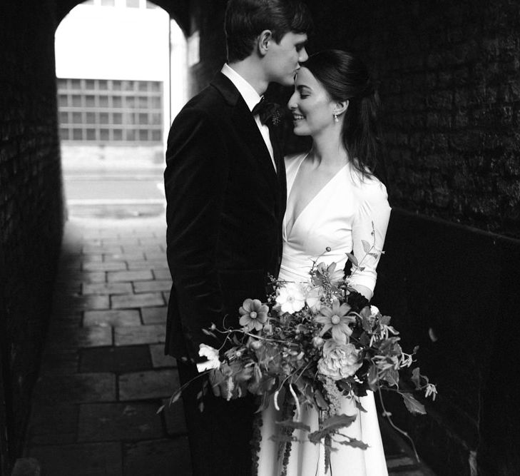 Elegant Bride in Delphine Manivet Prospere Wedding Dress & Groom in Velvet Jacket