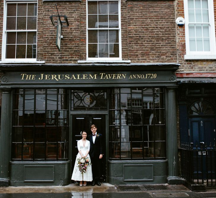 Elegant Bride in Delphine Manivet Prospere Wedding Dress & Groom in Velvet Jacket