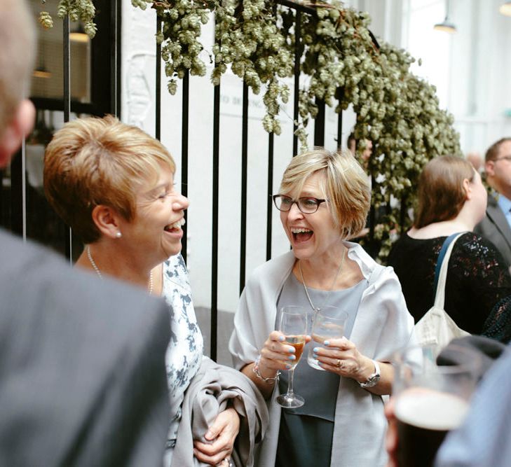 Wedding Guests with Stairs Floral Display