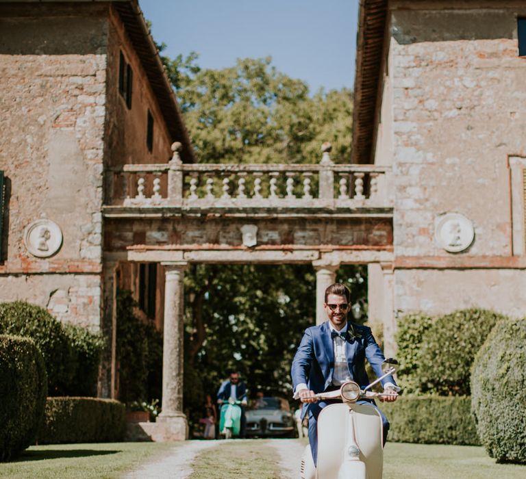 Vespa | Groom in Light Blue Suit Supply Suit & Bow Tie | D&A Photography | Ben Walton Films