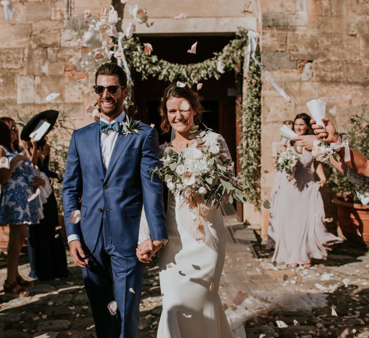 Confetti Exit | Bride in Morgan Davies Gown | Groom in Suit Supply | D&A Photography | Ben Walton Films