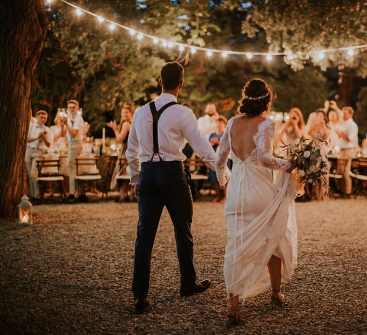 Festoon Lit Outdoor Reception | Bride in Morgan Davies Gown | Groom in Suit Supply | D&A Photography | Ben Walton Films