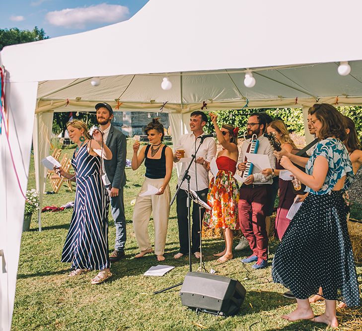 Outdoor Summer Wedding With Bright Colour Scheme With Colourful Homemade Decor And Images From Story + Colour Photography