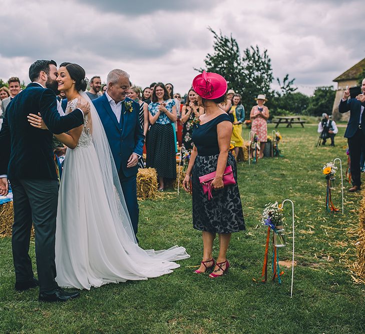 Outdoor Summer Wedding With Bright Colour Scheme With Colourful Homemade Decor And Images From Story + Colour Photography