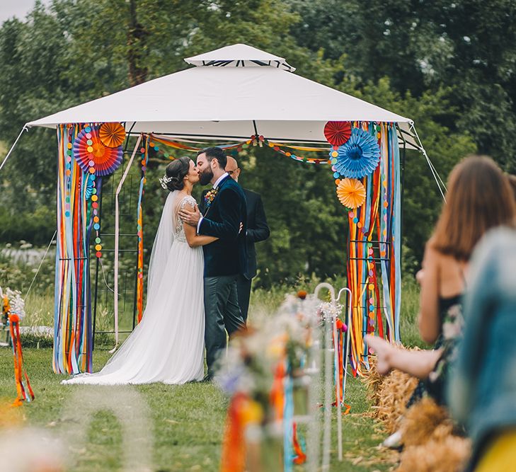 Outdoor Summer Wedding With Bright Colour Scheme With Colourful Homemade Decor And Images From Story + Colour Photography