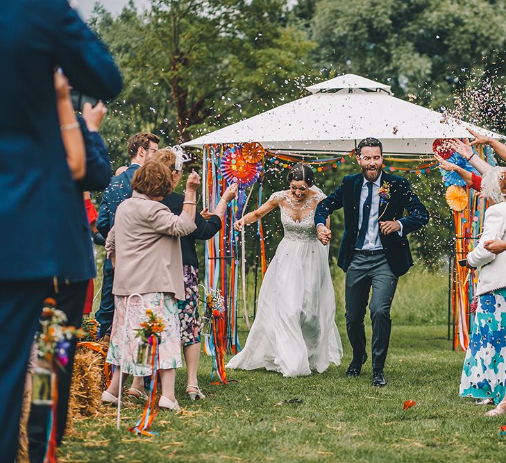 Outdoor Summer Wedding With Bright Colour Scheme With Colourful Homemade Decor And Images From Story + Colour Photography