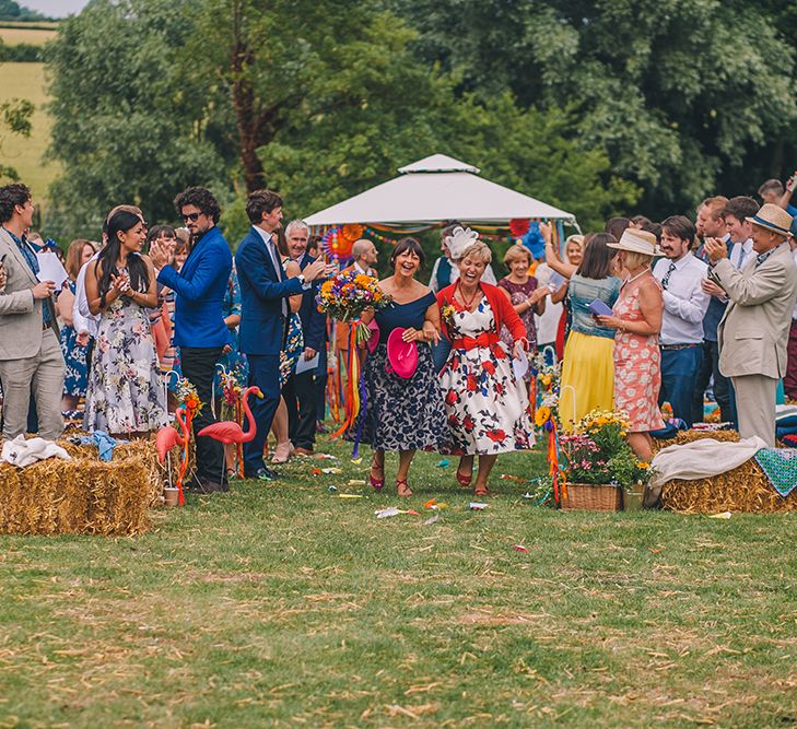 Outdoor Summer Wedding With Bright Colour Scheme With Colourful Homemade Decor And Images From Story + Colour Photography