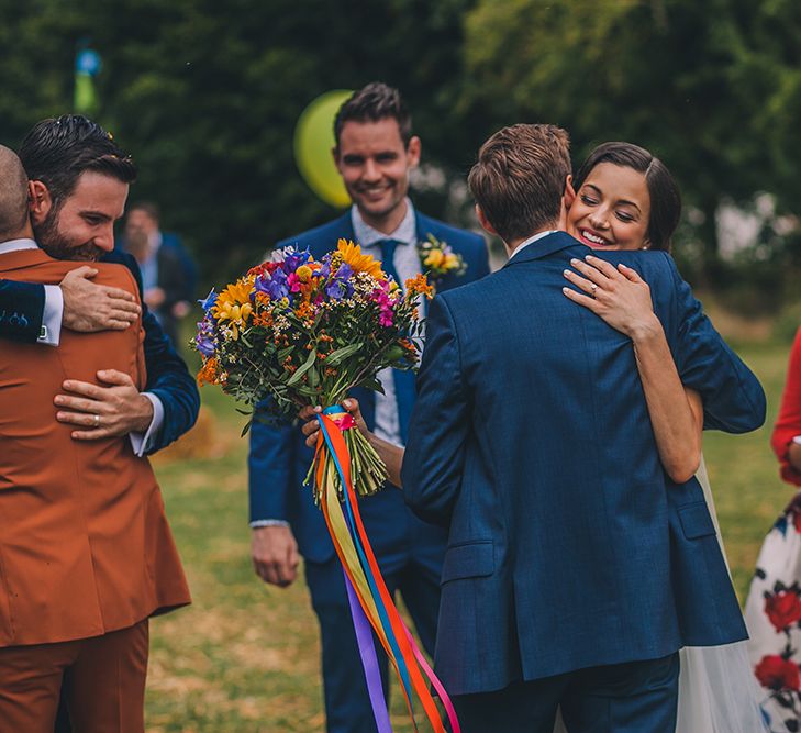 Outdoor Summer Wedding With Bright Colour Scheme With Colourful Homemade Decor And Images From Story + Colour Photography