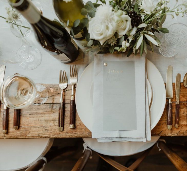 Wooden Trestle Tables With Soft Grey Runners, Taper Candles And White Florals For Wedding Image By The Curries