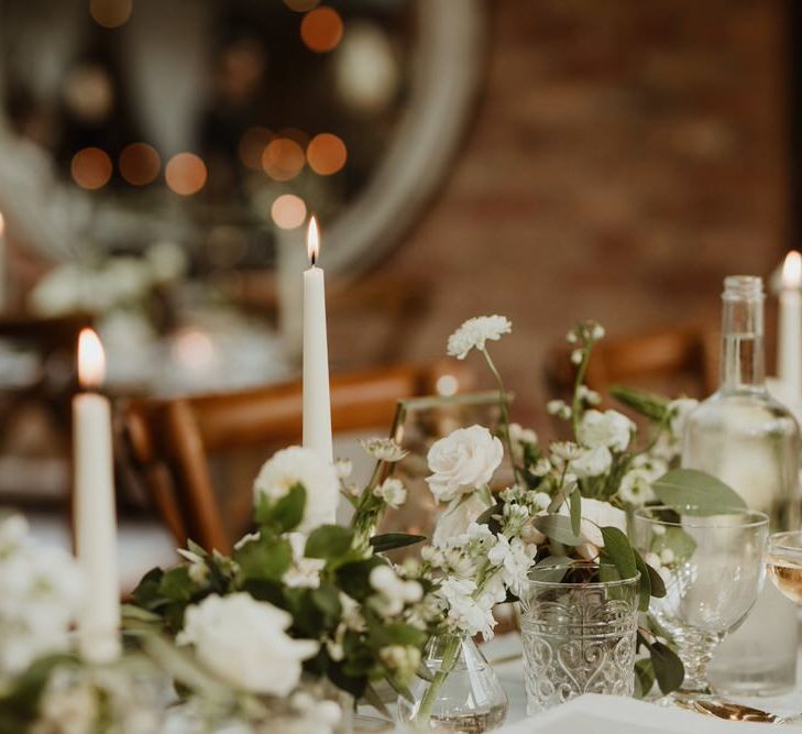 Wooden Trestle Tables With Soft Grey Runners, Taper Candles And White Florals For Wedding Image By The Curries