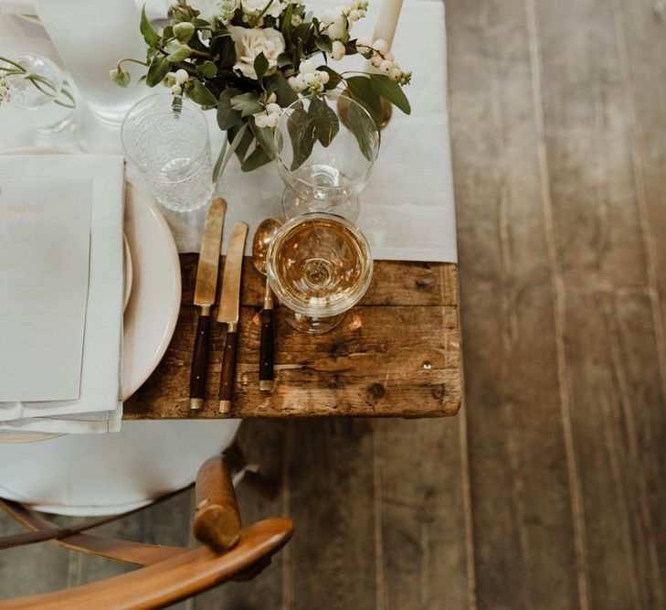 Wooden Trestle Tables With Soft Grey Runners, Taper Candles And White Florals For Wedding Image By The Curries