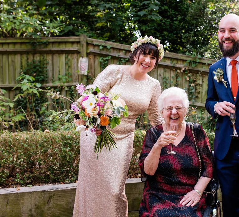 Wedding Ceremony at Vest House Museum with Bride in Pre Owned Gold Sequin Badgley Mischka Wedding Dress & Groom in Suit Supply