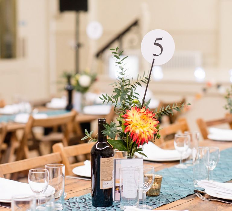 Hand Picked Flower Stems in Vases as Table Centrepieces